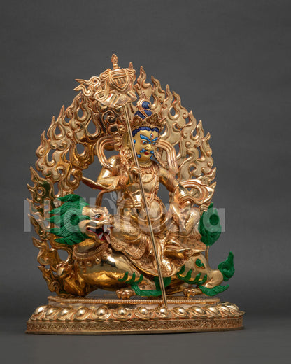 Right side view of Namtoshe Statue, Nepalese copper gold gilded Buddhist wealth deity on snow lion