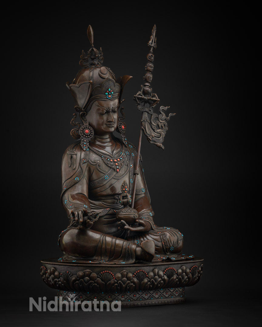 Right side view of oxidized copper Guru Rinpoche statue