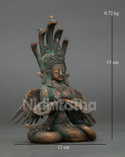 Right side view of oxidized copper Nagakanya statue from Nepal