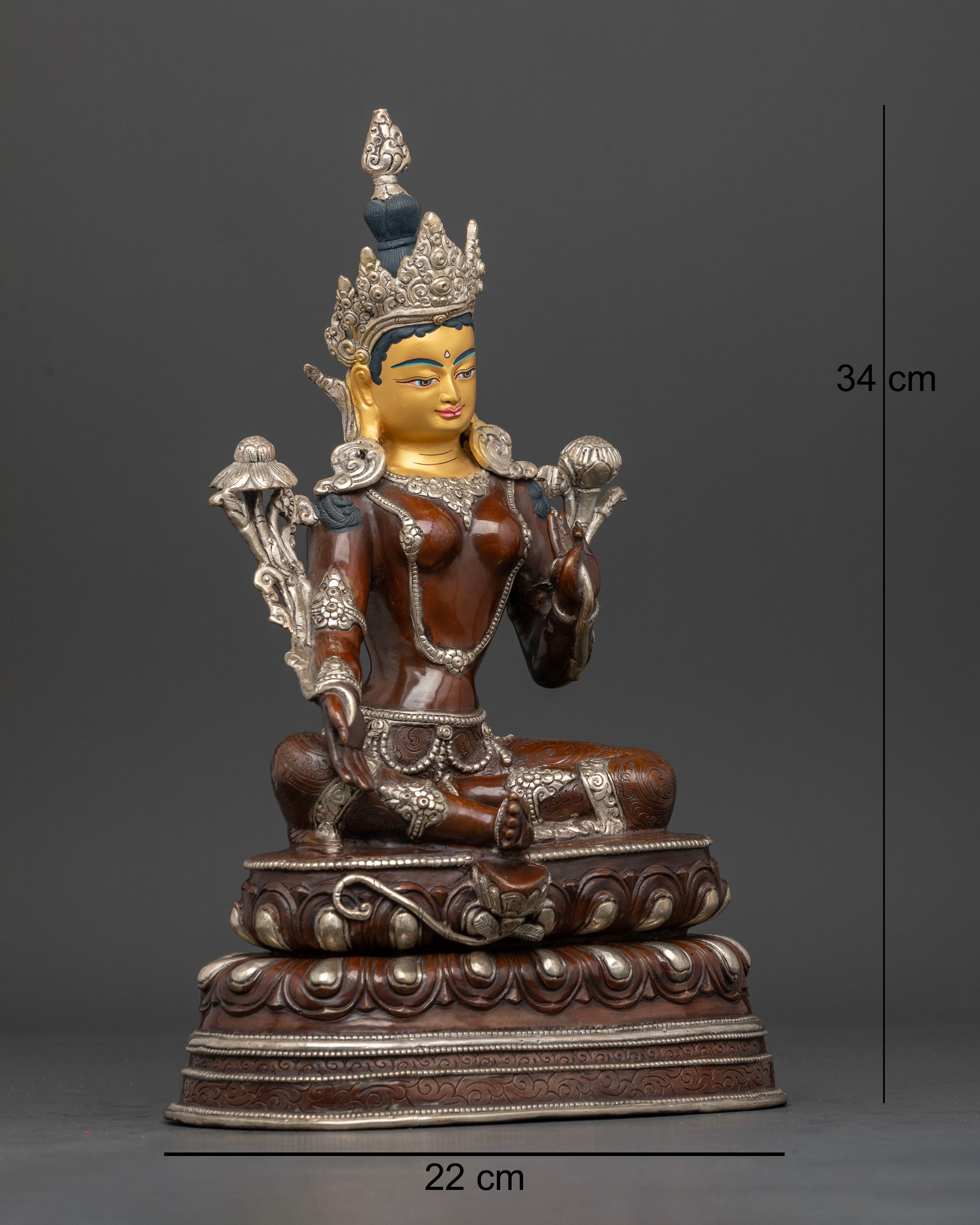 Right side view of oxidized Green Tara goddess statue seated in royal ease posture on lotus seat.