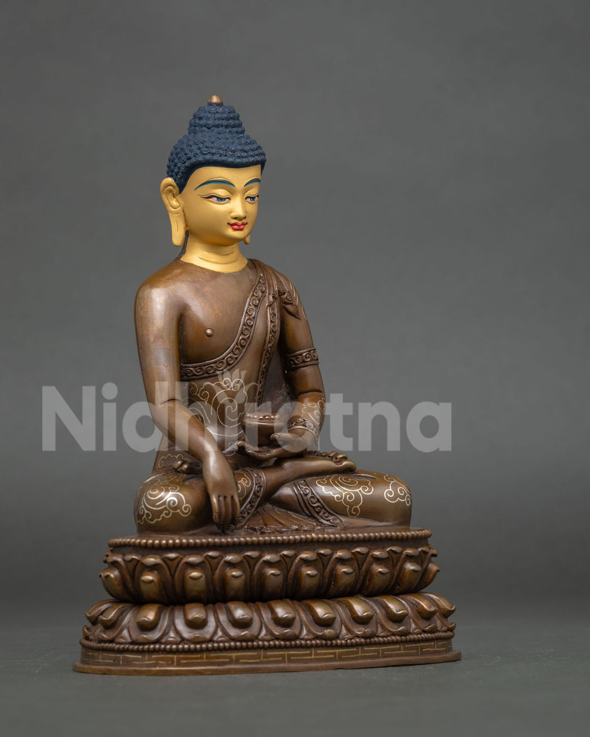 Right side view of Shakyamuni Buddha statue in Earth-Touching Mudra, oxidized copper from Nepal