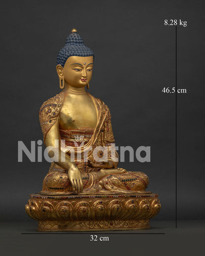 Right side view of Shakyamuni Buddha Statue with fire gilded copper and ornate robe details