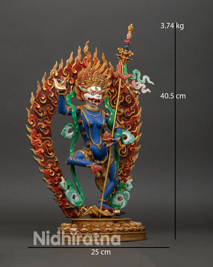 Right side view of Simhamukha Statue, standing on lotus and subduing human figure