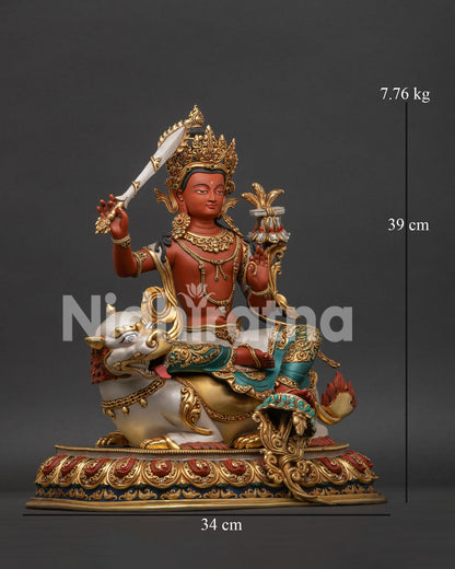Right side view of Simhanada Manjushri statue with gemstone ornamentation