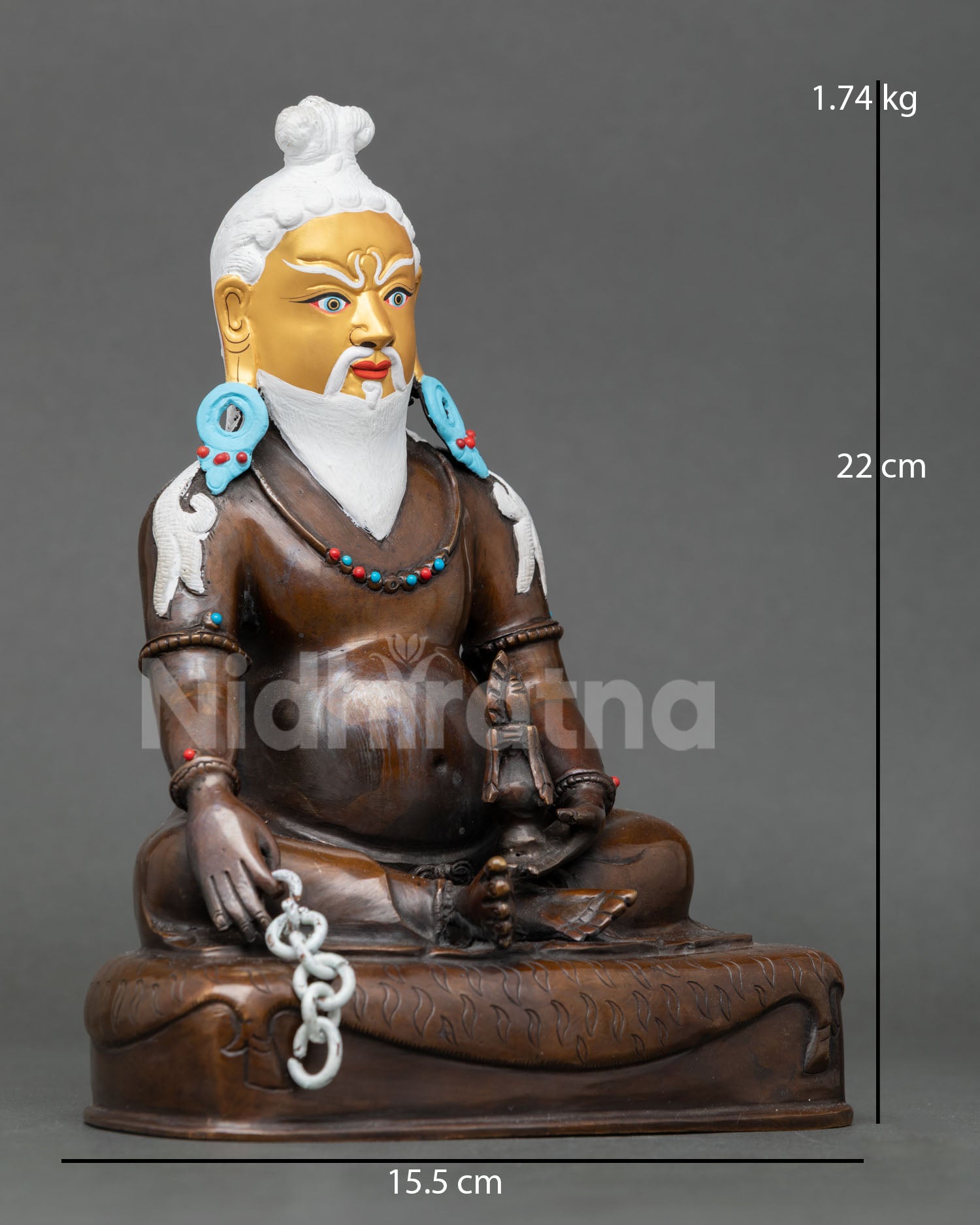 Right-side view of Thangtong Gyalpo oxidized copper statue holding chain and vase
