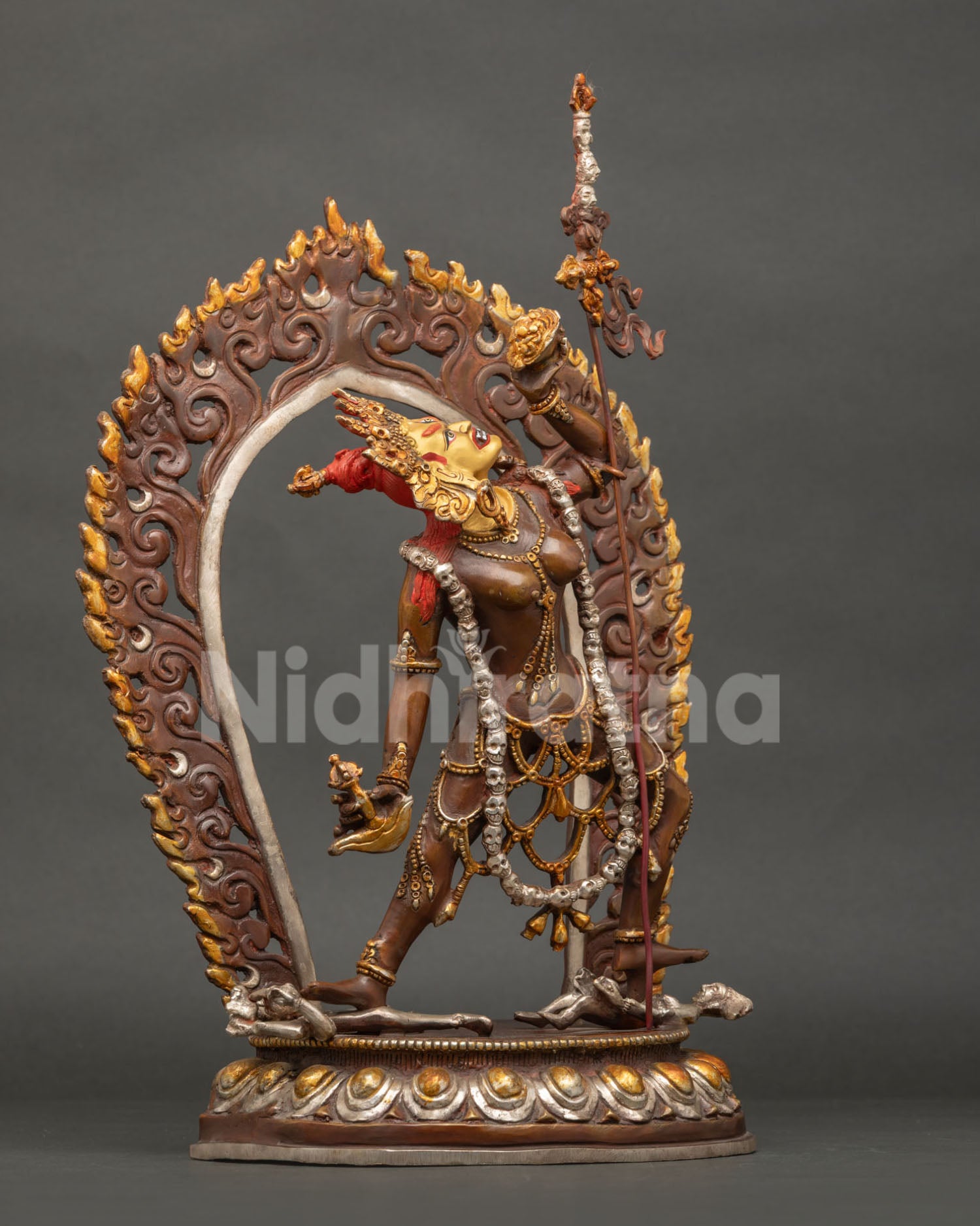 Right side view of Vajrayogini statue with skull garland and kartika detailing