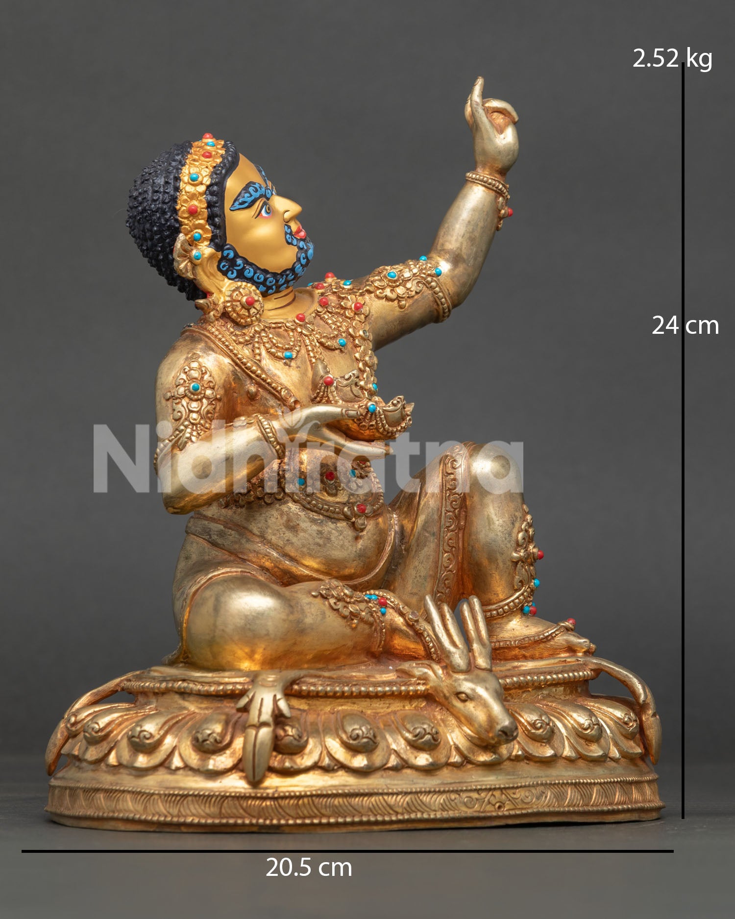 Right-side view of Virupa Statue seated on lotus throne with deer skin and handcrafted Buddhist details