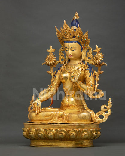 Right side view of White Tara statue, gold-gilded copper Buddhist sculpture