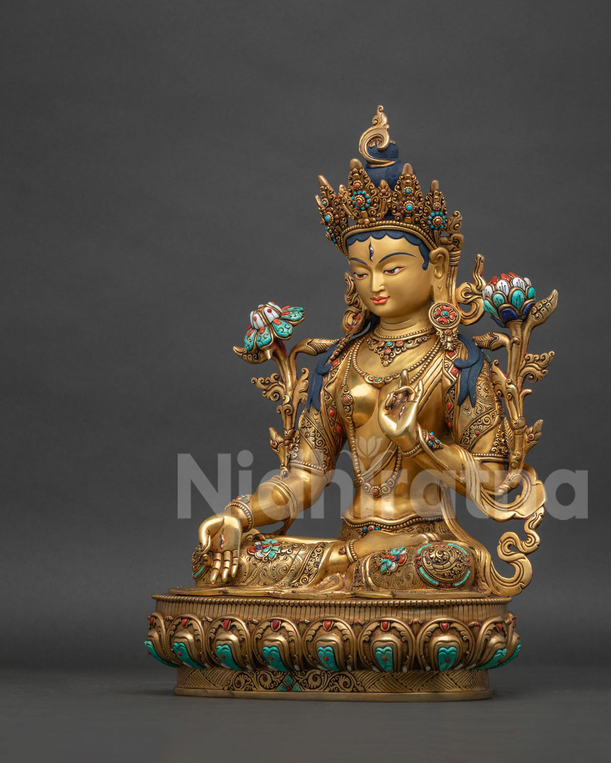 Right side view of White Tara statue, gold-gilded copper Buddhist sculpture