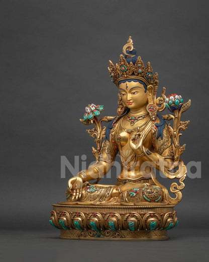 Right side view of White Tara statue, gold-gilded copper Buddhist sculpture