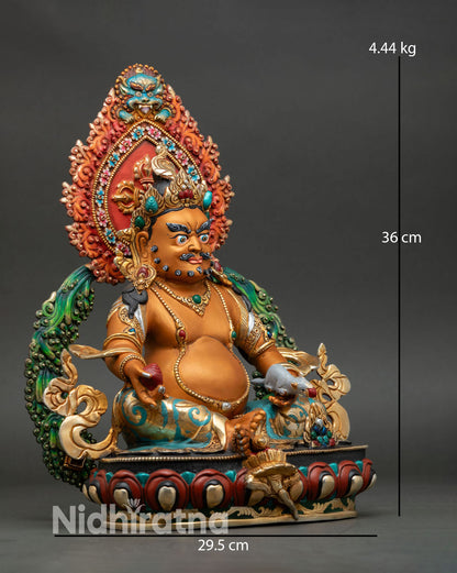 right side view of yellow dzambhala statue wealth god sculpture nepalese copper artwork with gold finish and ornaments