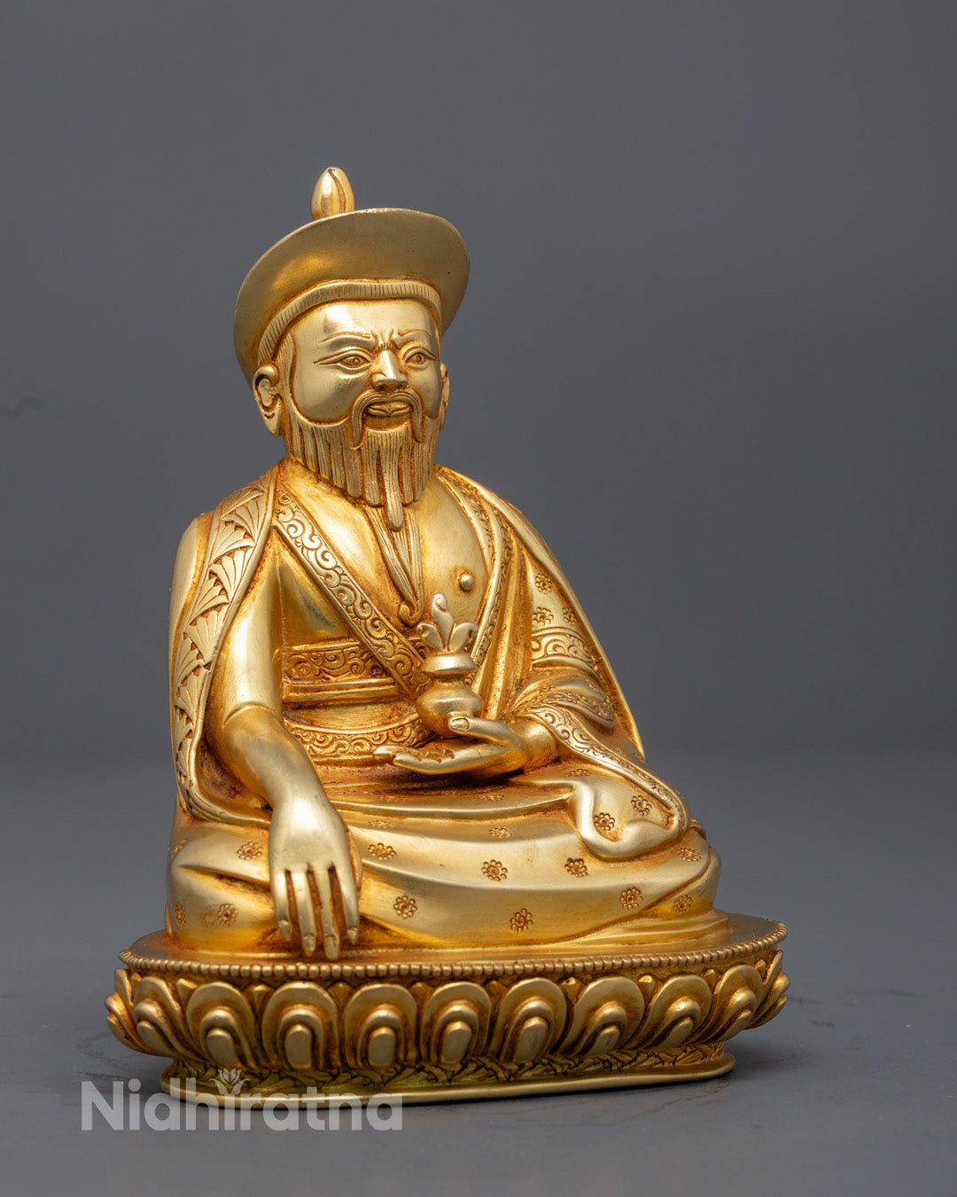 Right side view of Zhabdrung Namgyal statue handcrafted fire gilded Nepal