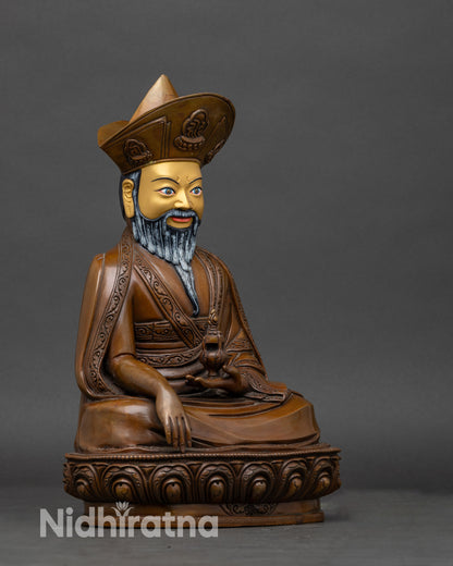 Right side view of zhabdrung rinpoche statue, displaying sacred ritual objects and wrathful expression