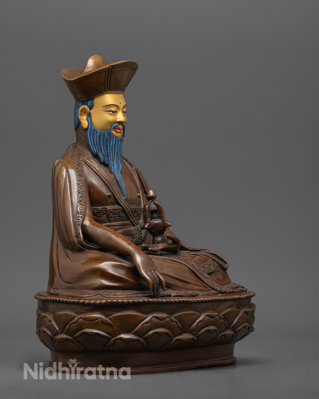 right side view of zhabdrung rinpoche statue, lotus seat and traditional newari craftsmanship