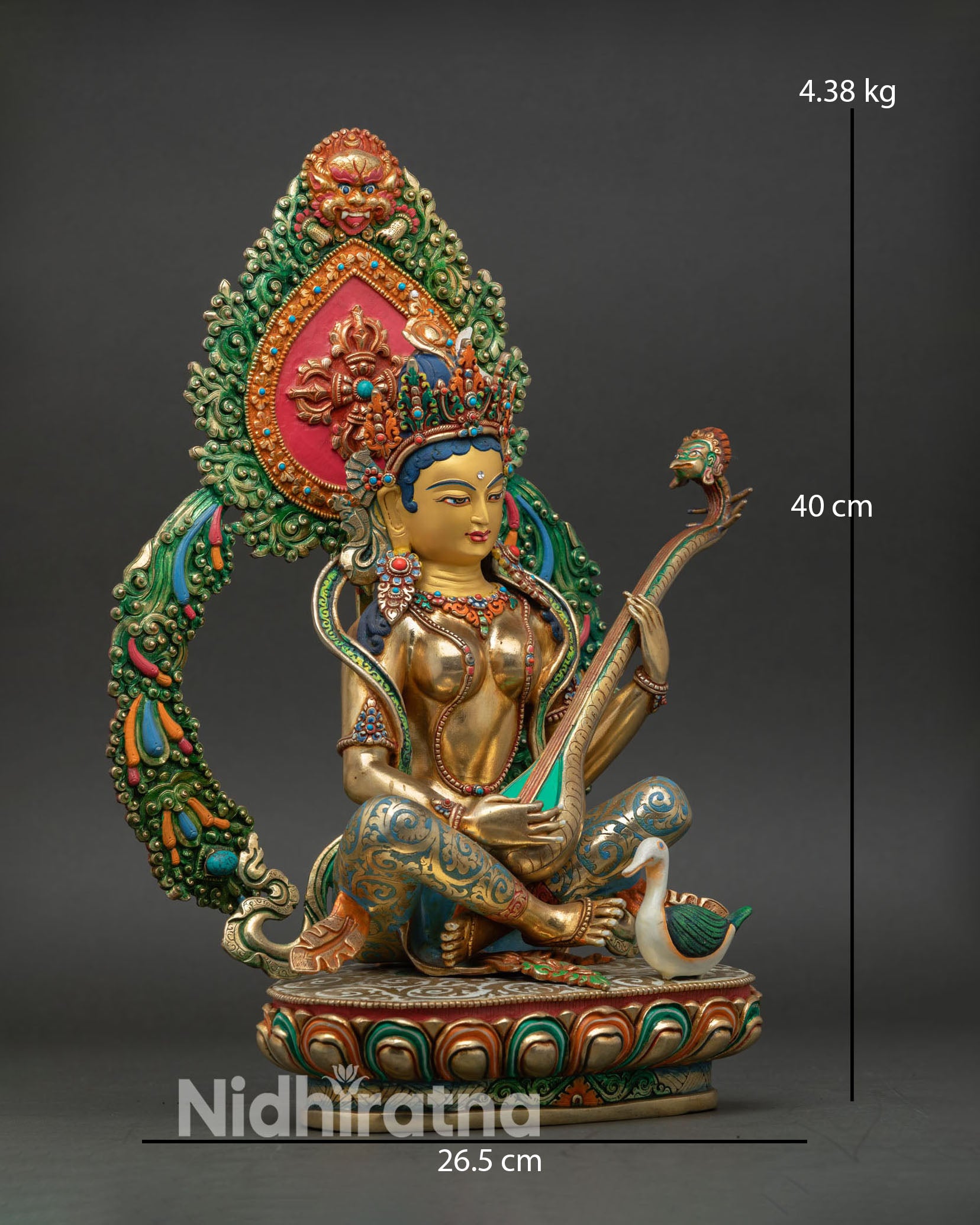 right side view saraswati statue, copper gold gilded with vina and swan detail