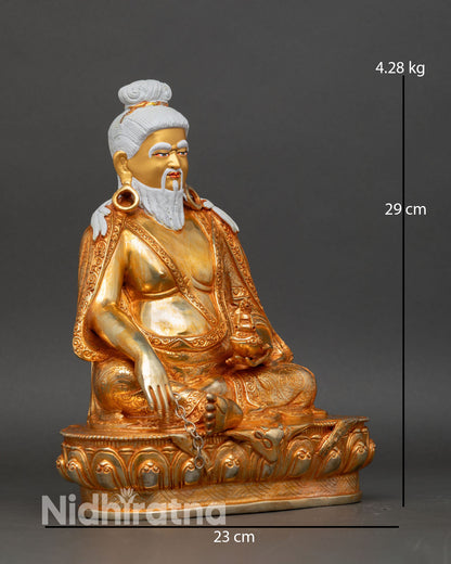 Right side view Thangtong Gyalpo statue, copper gold gilded Nepal