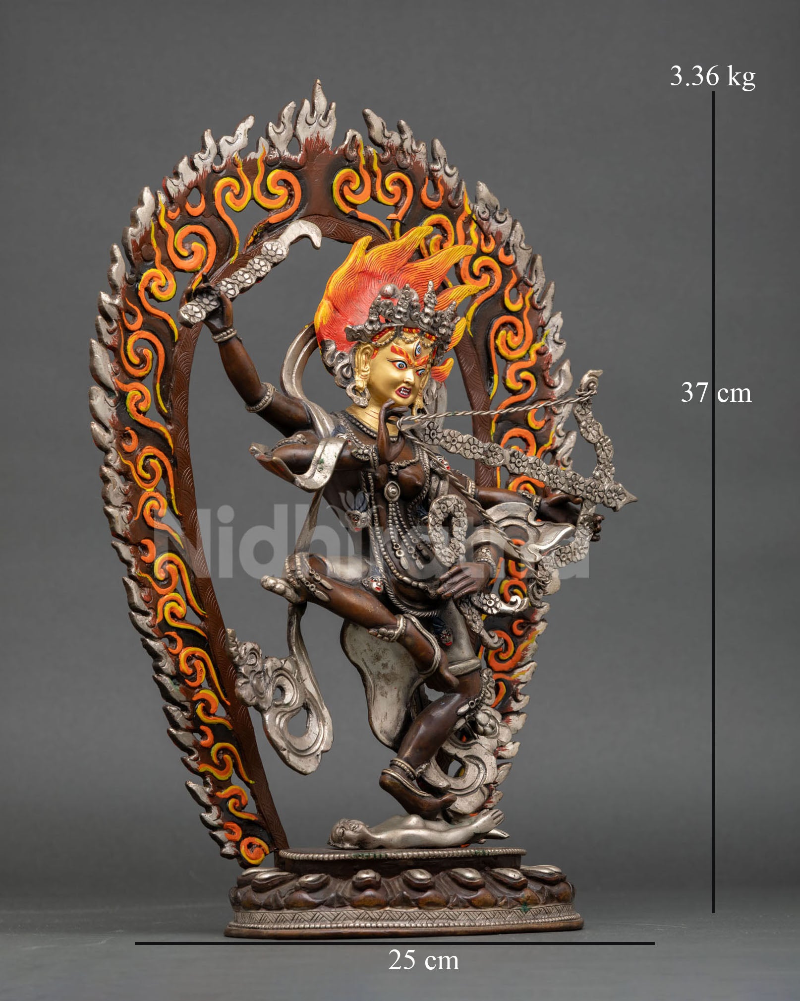 Right view Kurukulla statue, copper tantric deity holding bow and arrow symbol of magnetism