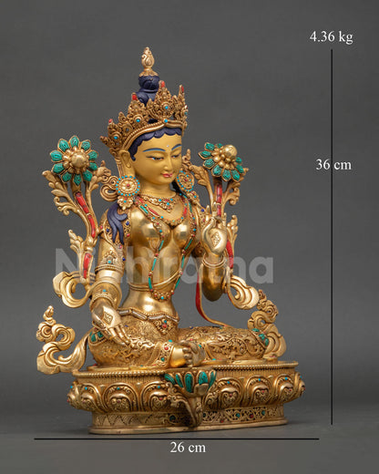 Right view of Green Tara Statue with lotus flowers and sacred ornaments