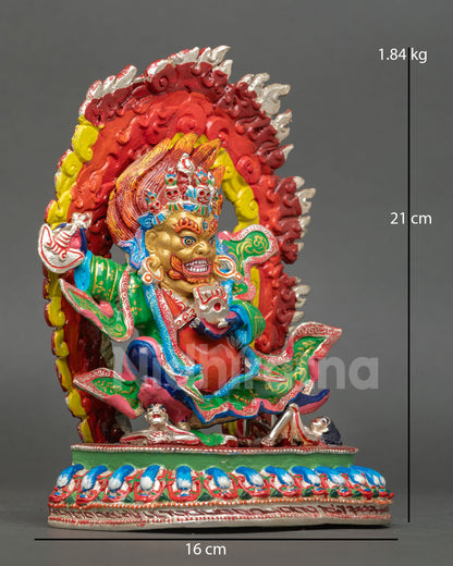 right view of mahakala bernagchen statue crushing evil deities on lotus throne