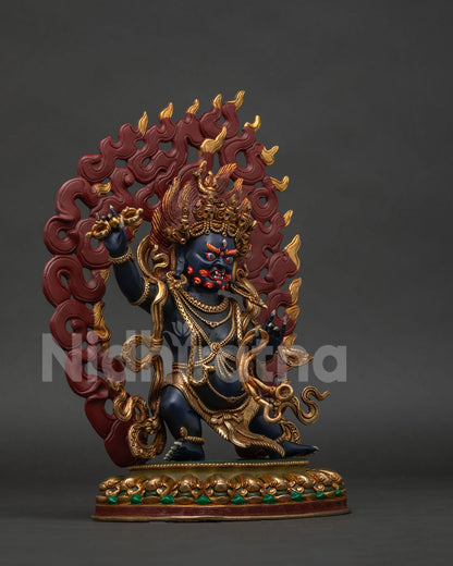 Right view of standing copper Vajrapani Bodhisattva statue with blazing wisdom fire halo.