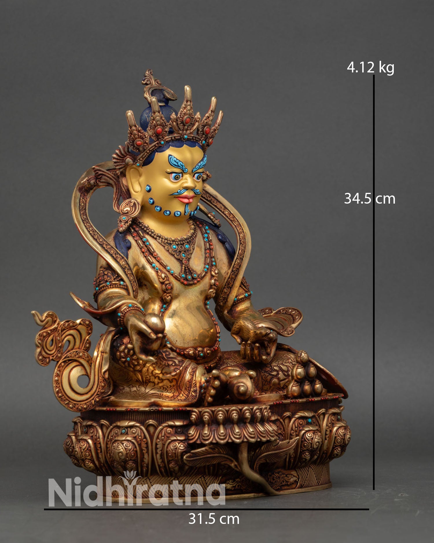 right view side dzambhala figurine seated on lotus base with intricate inlays