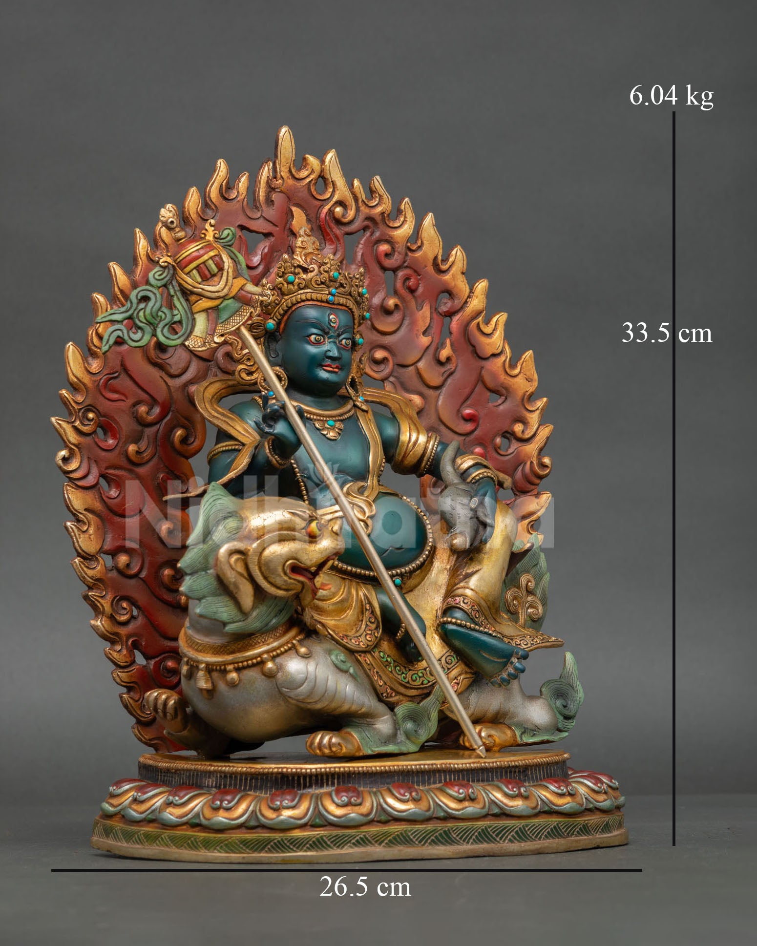 Right side view Namtoshe statue seated on snow lion with victory banner and mongoose symbol of abundance handcrafted Nepal art