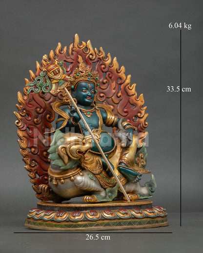 Right side view Namtoshe statue seated on snow lion with victory banner and mongoose symbol of abundance handcrafted Nepal art