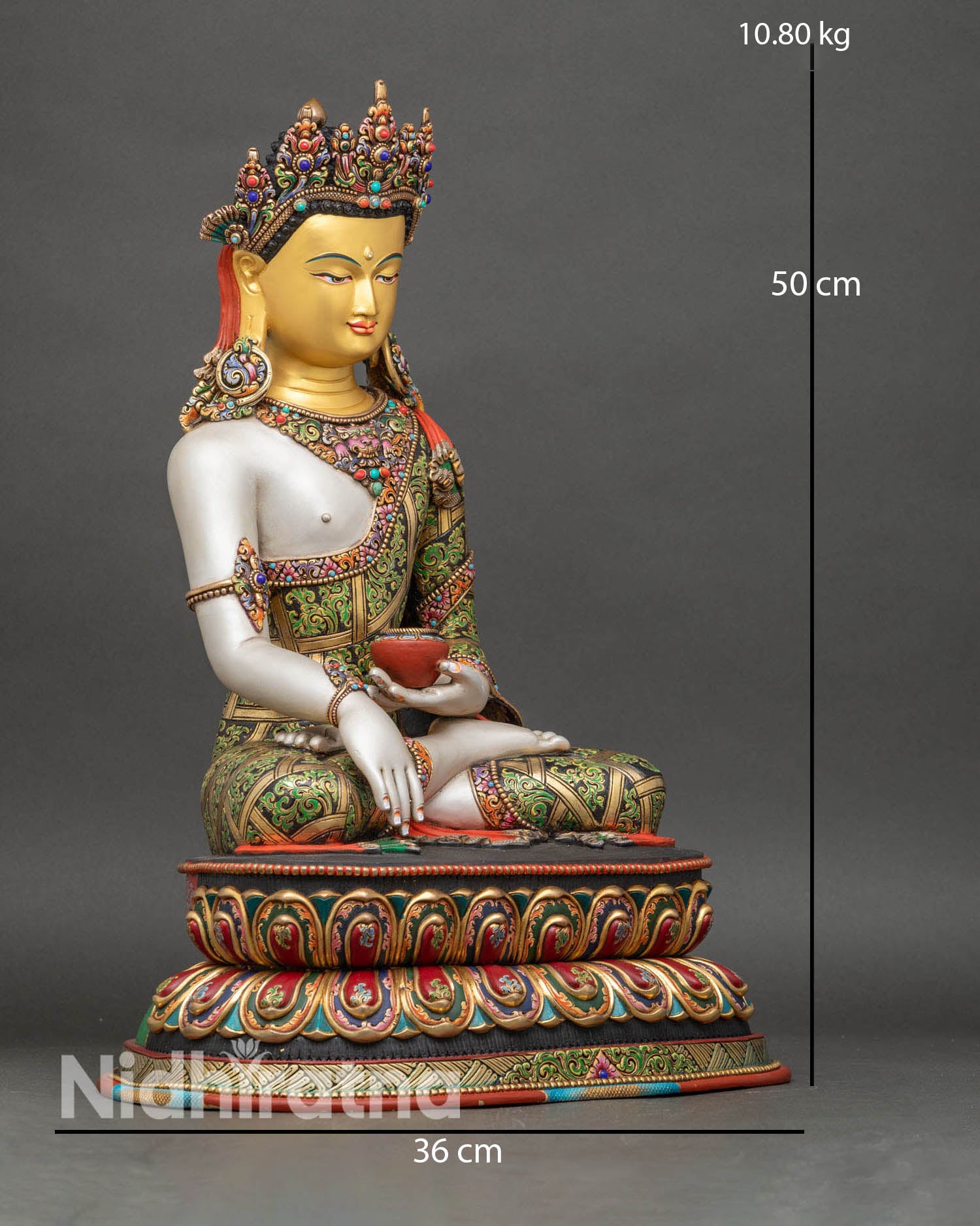 right view side of crown shakyamuni buddha statue highlighting bhumisparsha mudra and lotus posture