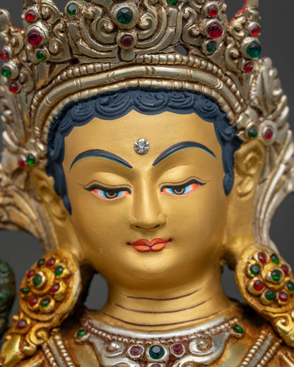 detailed close up face of green tara statue 24k gold painted