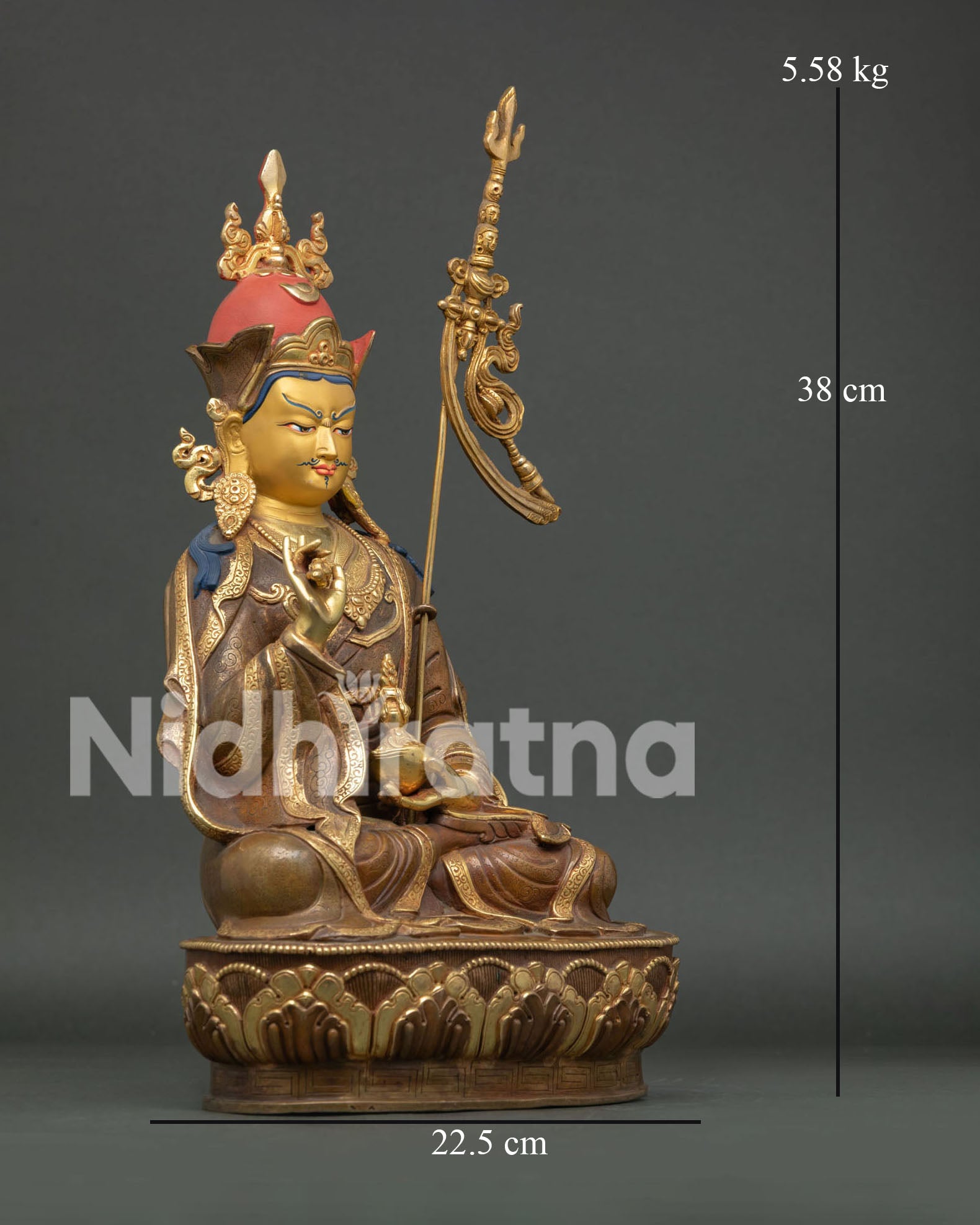 Right view side of handcrafted Tsokye Dorje copper statue with khatvanga staff