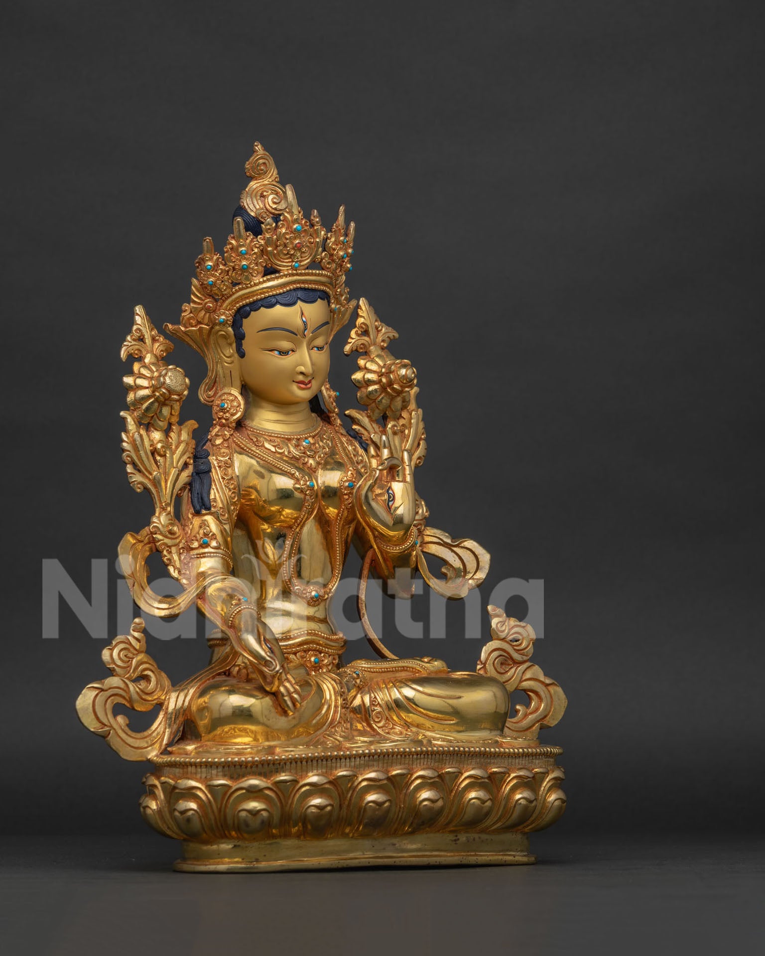 Right view side of White Tara Statue showing handcrafted copper sculpture and lotus pedestal