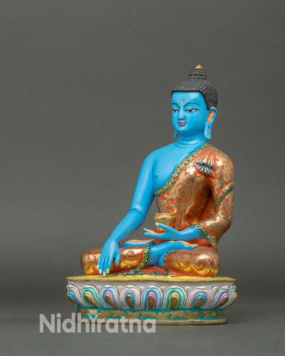 left view of blue buddha statue with lotus throne and handcrafted copper detailing