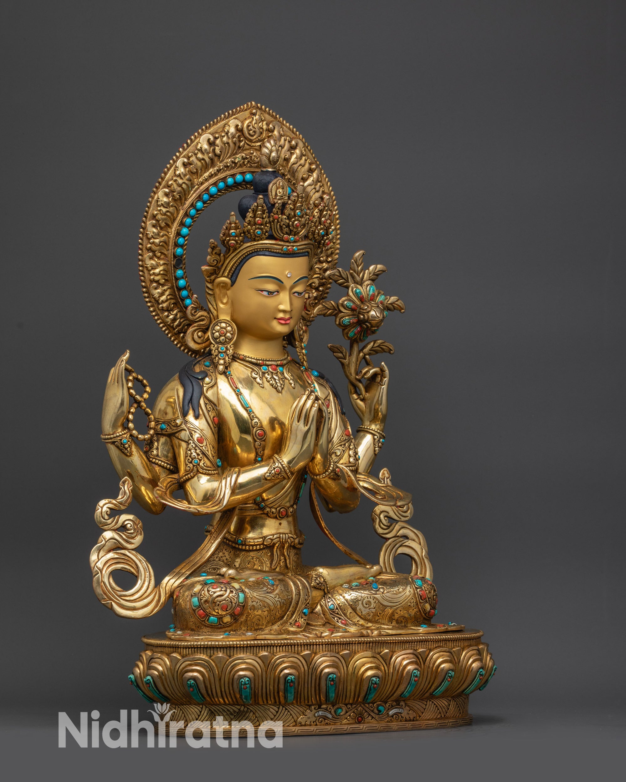right view side Four-Armed Chenrezig statue on lotus base holding lotus, rosary, vase and jewel