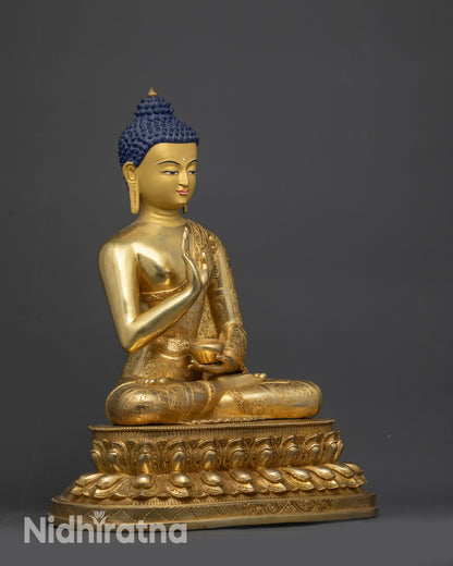 right view side amoghasiddhi buddha statue holding bowl on double layered lotus base
