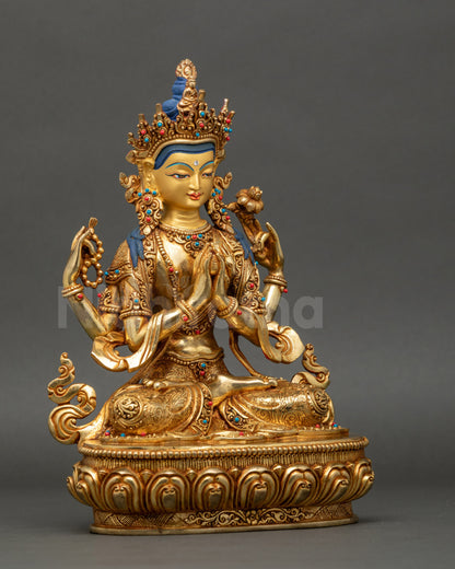 right view side of Chenrezig statue displaying gilded copper and semi-precious gems
