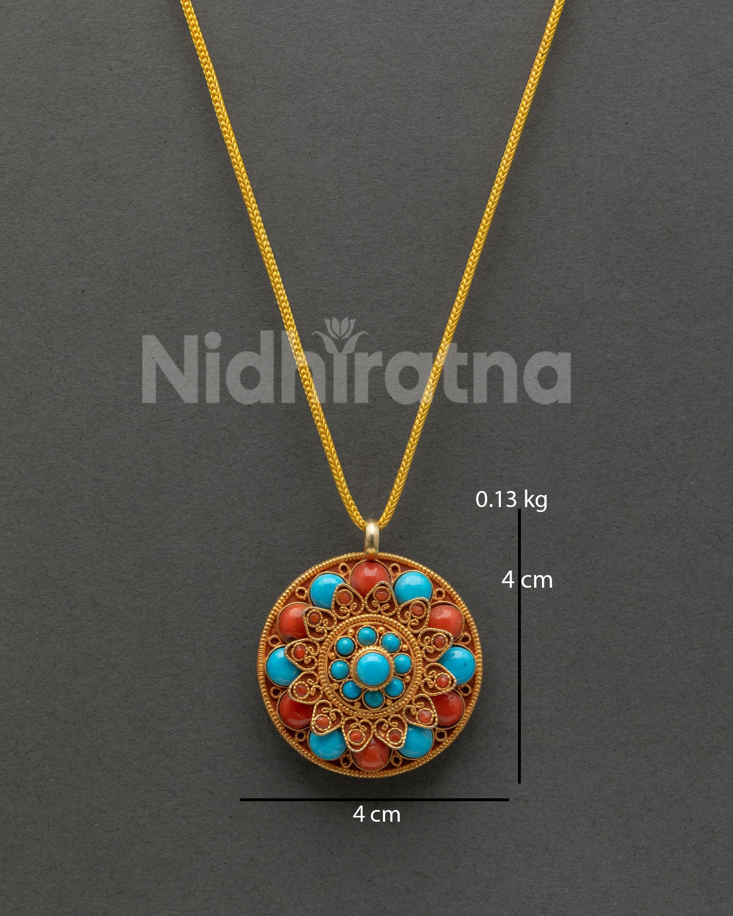 Round turquoise and coral flower locket with gold plated details from Nepal