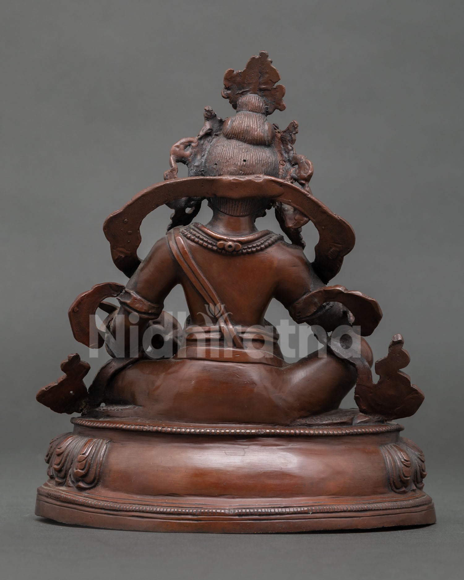 dzambhala-statue-handcrafted-by-newar-artisan-from-patan-nepal-with-oxidized-copper-finish-and-lotus-pedestal.
