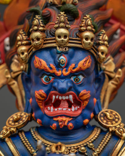 Sakya Mahakala statue detailed face close up with intricate gold gilded finish