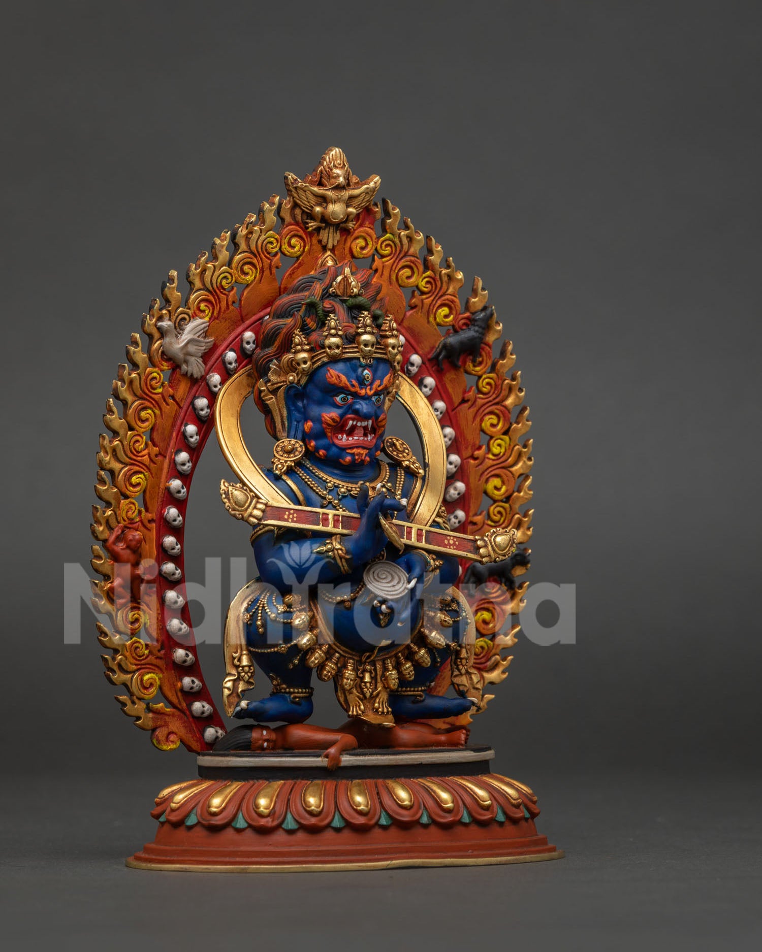 Sakya Mahakala statue right side view showing gold gilded copper craftsmanship