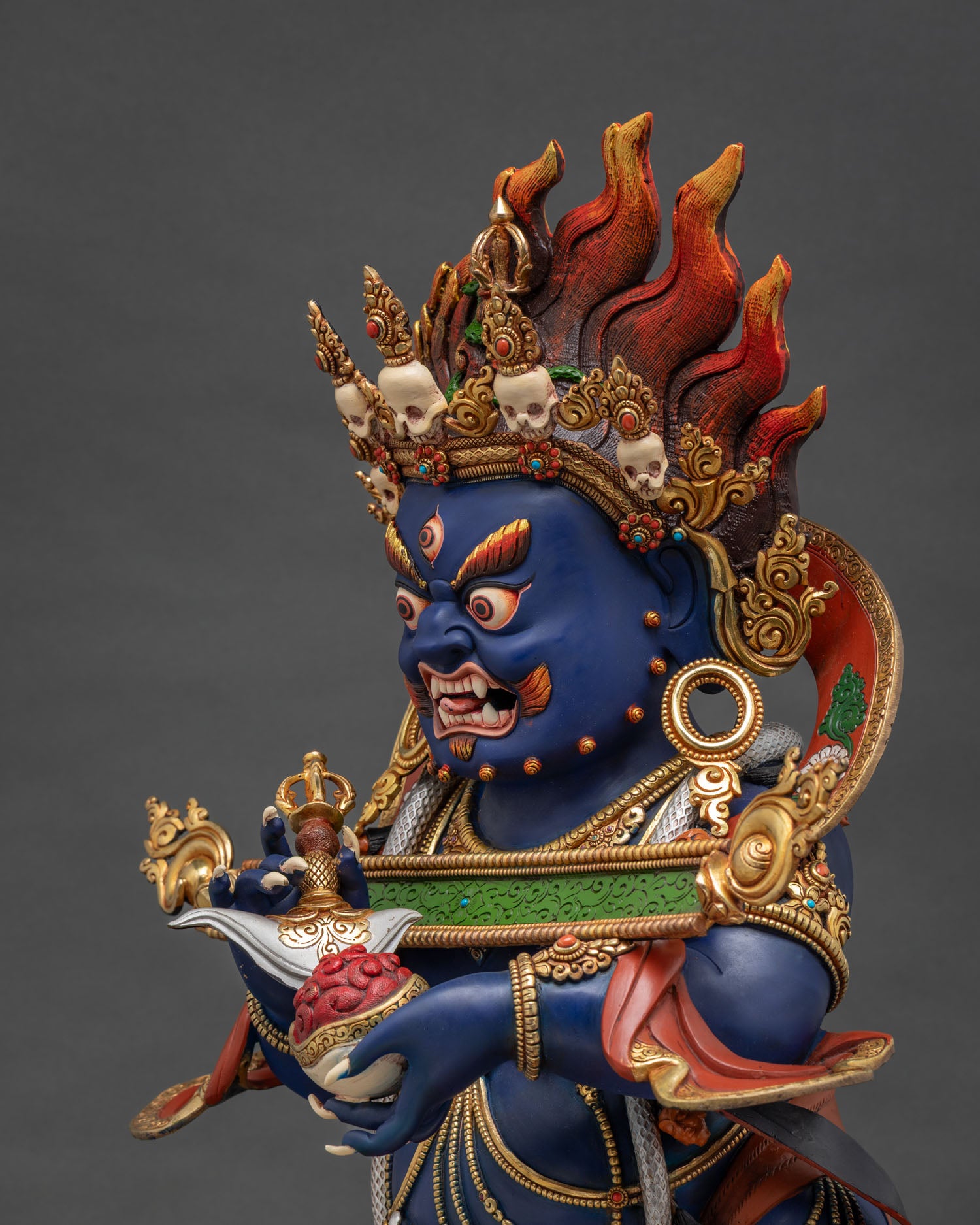 Sakya Mahakala Statue Side Close-Up – Flaming Halo & Skull Garland Detail