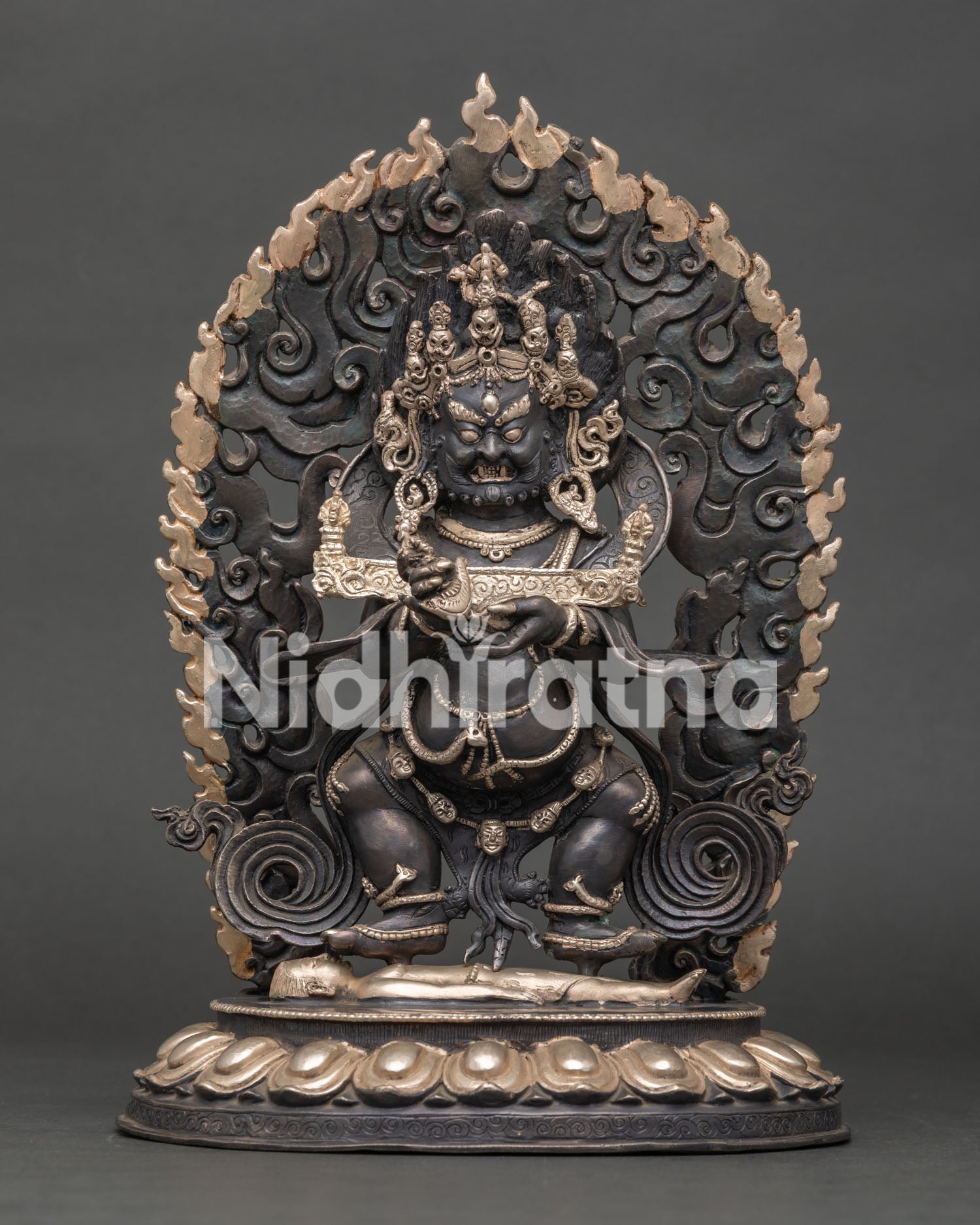 Sakya Mahakala statue standing on lotus pedestal, handcrafted copper Buddhist protector deity with wrathful expression and fire flames
