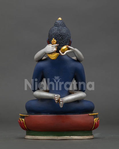Samantabhadri holding kapala and kartika knife beside samantabhadra statue.