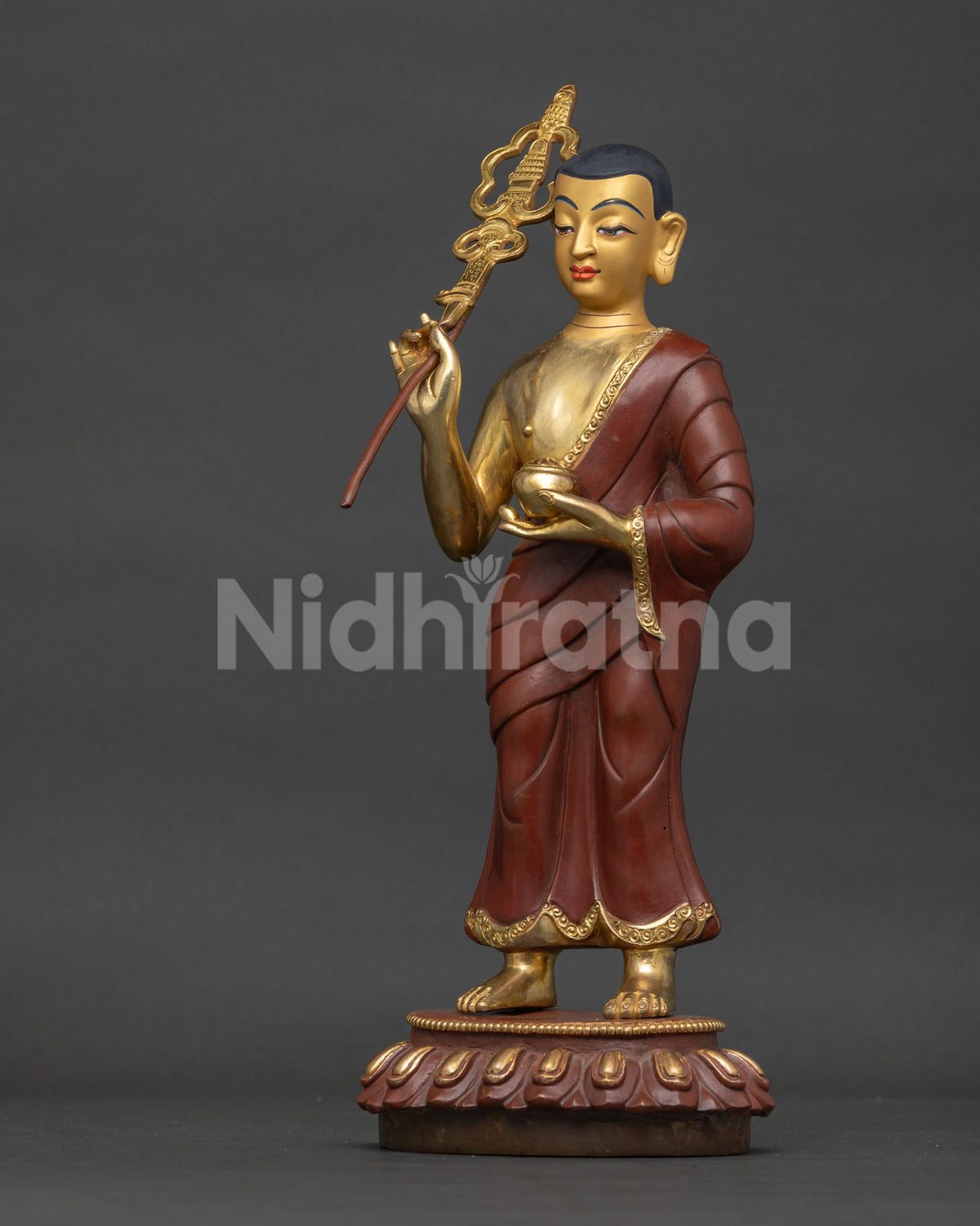 Sariputra statue left side view, gold gilded Buddhist disciple sculpture