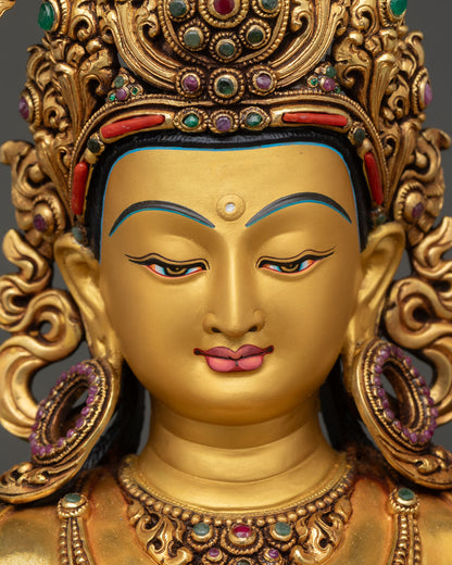 Detailed close up face: serene gold painted face Manjushri bodhisattva expression of enlightened wisdom