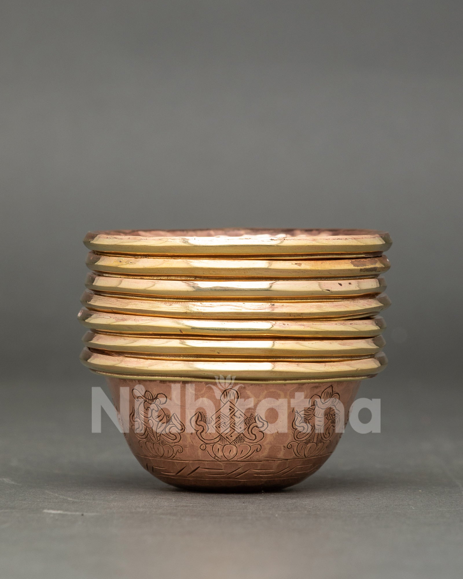 Set of seven copper water offering bowls for altar rituals and meditation