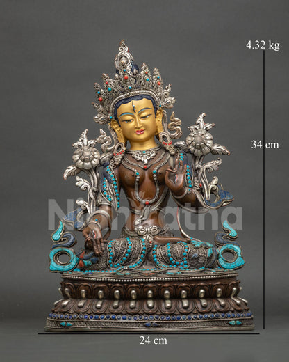 Seven-Eyed White Tara Statue front view, oxidized copper figurine with gold face and gemstone crown
