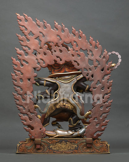 Shadbhuja Mahakala Statue back view with flaming hair and carved copper base detail