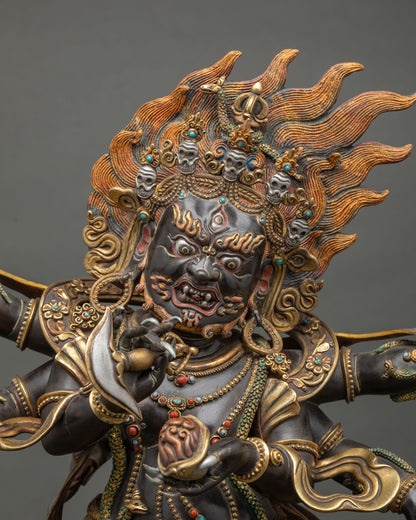 Shadbhuja Mahakala Statue face close up with third eye, bared fangs and skull crown