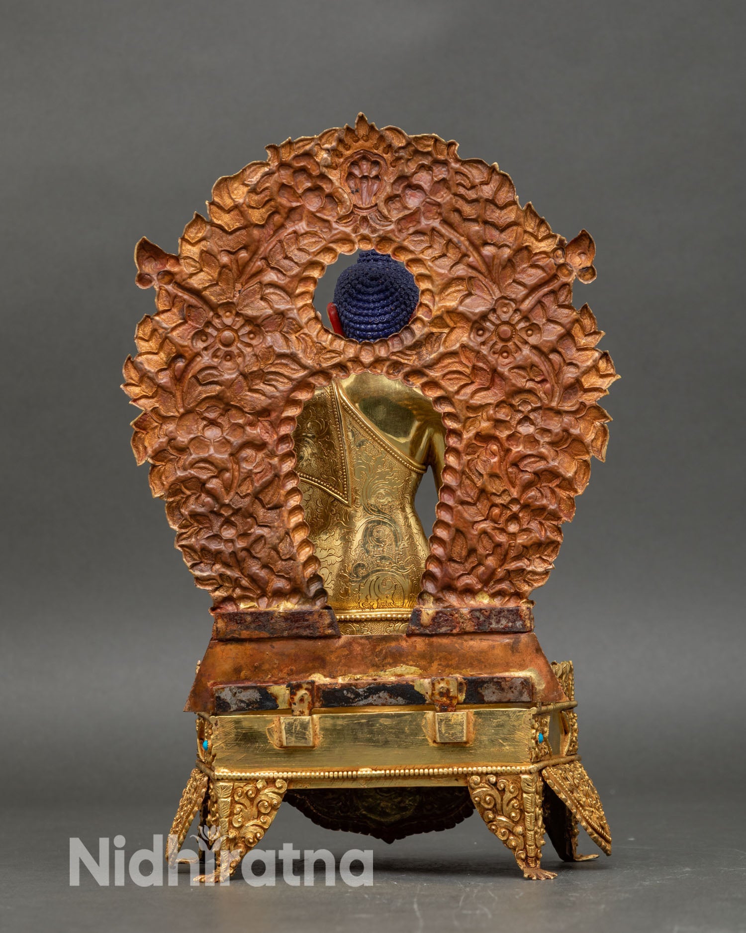 shakyamuni buddha back view, detailed robe lotus base nepalese art statue