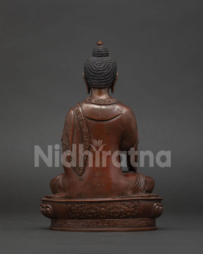 Shakyamuni Buddha back view displaying handcrafted lotus pedestal with vajra symbol.